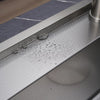 Water droplets beading on the Honeycomb sink floor