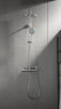 Rova Triple-Outlet shower set in use: mixing lever, swivel spout, handshower and rain shower