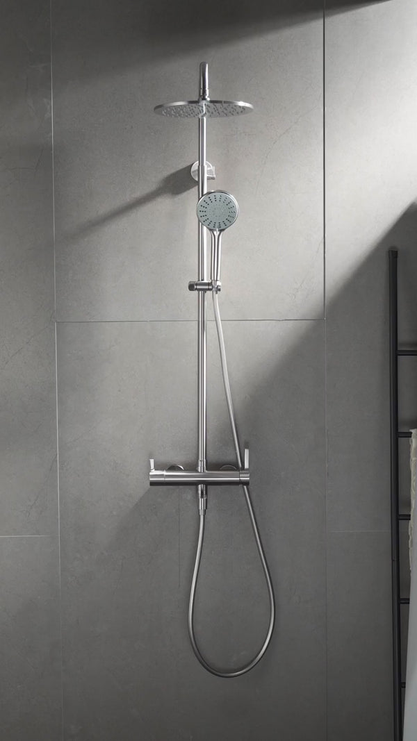 Rova Triple-Outlet shower set in use: mixing lever, swivel spout, handshower and rain shower