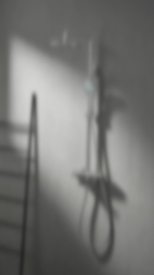 Rova Thermostatic shower set in use: 38°C safety button, swivel spout, handshower and rain shower